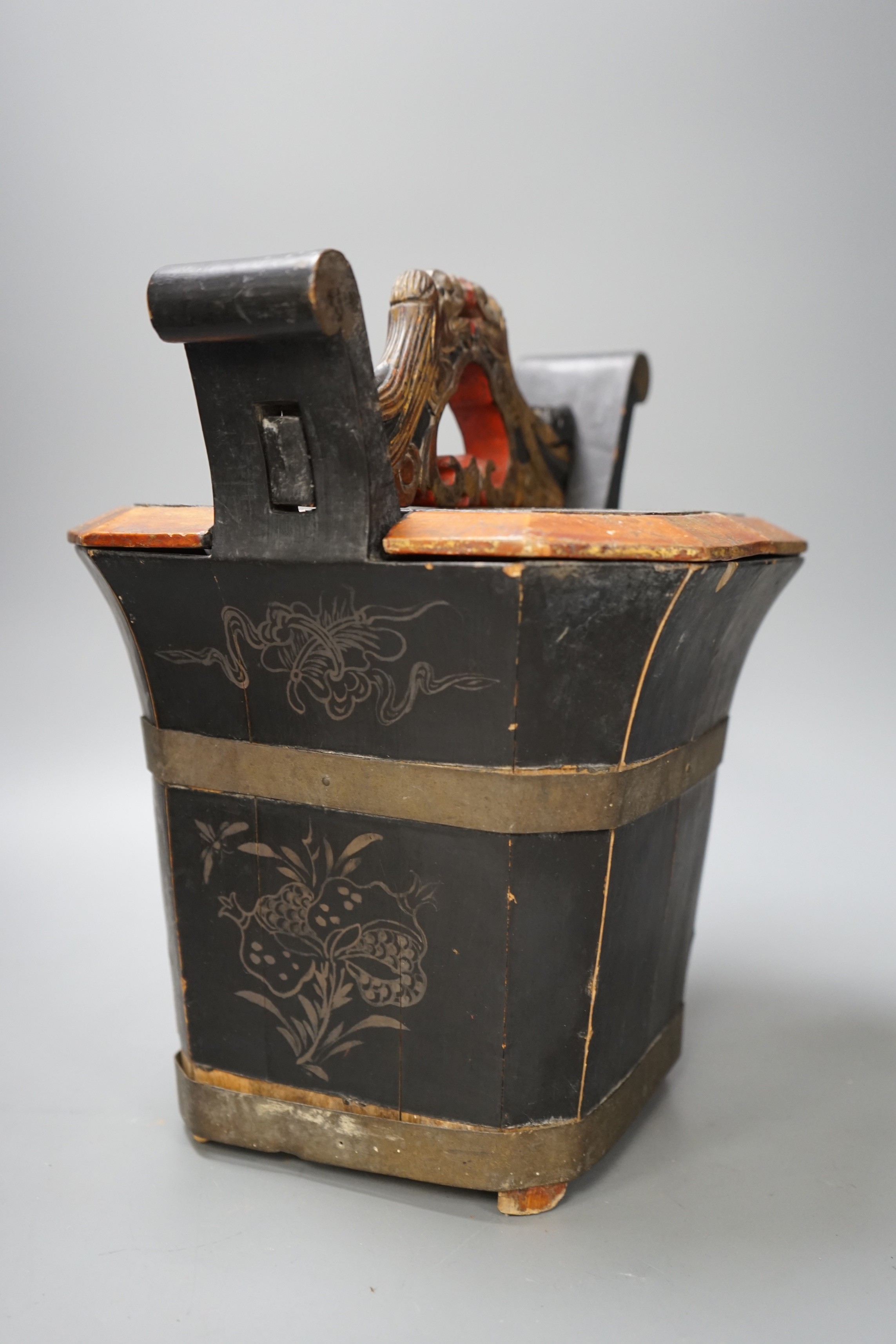 A Chinese antique tea caddy with painted dragon handle decoration, 31cm tall